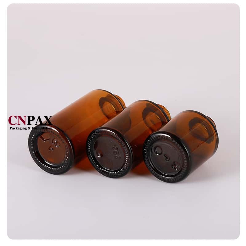 cylinder round amber glass bottles